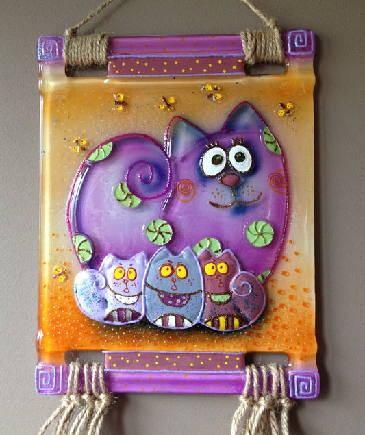 Hand-painted glass artwork panel featuring a mother cat with her kittens, ideal for enhancing home decor with familial charm