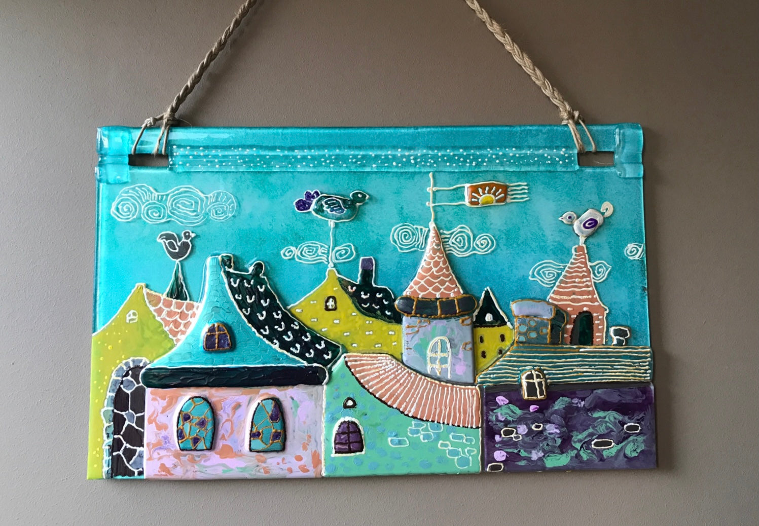Walk in the Clouds City Roofs Glass Panel Wall Art - Hand-Painted Fused-Glass Panel with Whimsical Weather Vanes, 49 cm