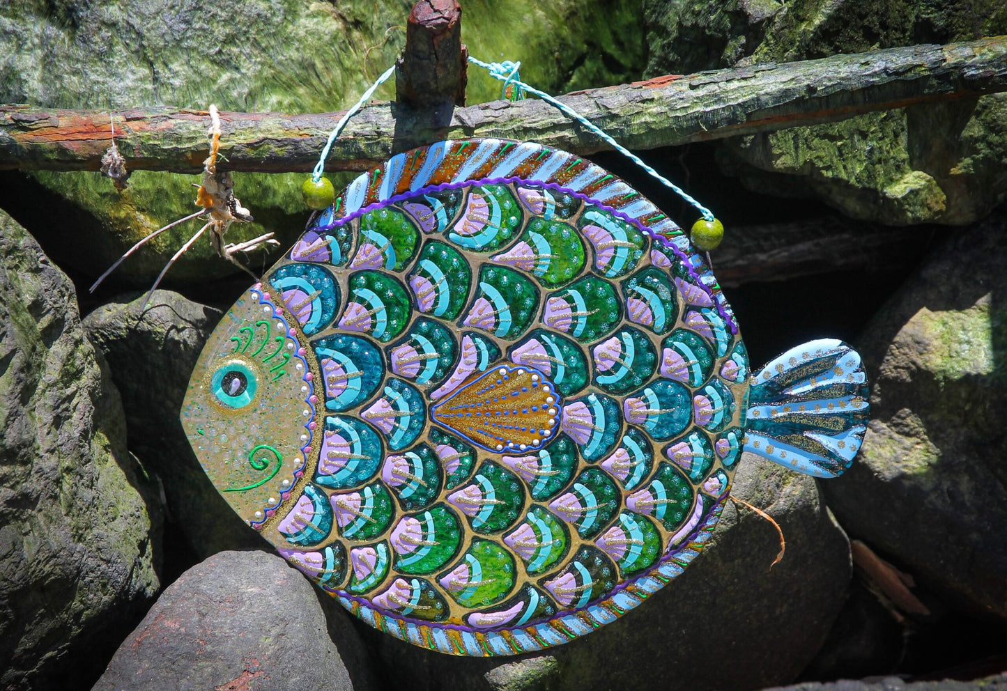 Purple Big Fish glass artwork symbolizing happiness