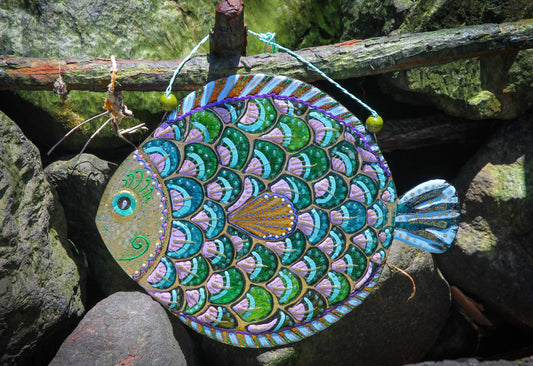 Purple Big Fish glass artwork symbolizing happiness