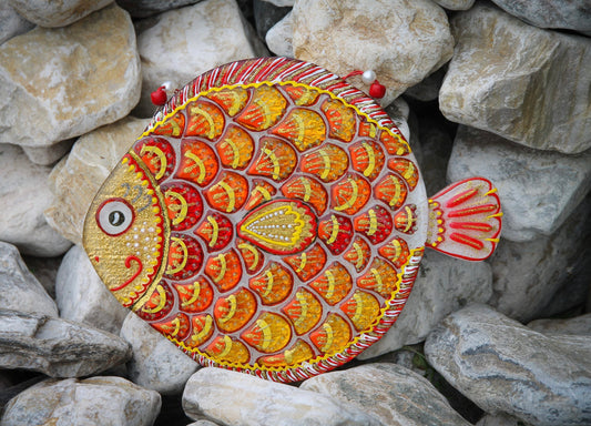 Orange Big Fish glass artwork promoting happiness